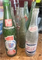 Lot of 10 vintage soda bottles-7 up 1979