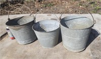 3 galvanized buckets.