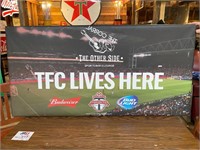 TFC Lives Here sign from The Corral