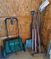 lawn seeder and long handled tools