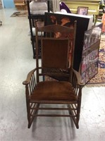 Brown cushioned rocking chair