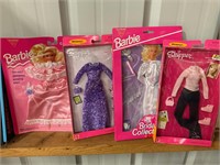 4 sets of Barbie doll clothes