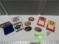 Belt buckles, commemorative medallions, money clip