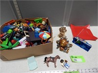 Box of toys and toy parts