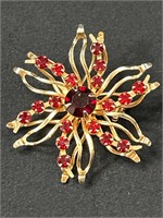 Vintage Goldtone with red rhinestones brooch