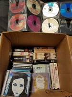 Odd lot of VHS and CDs