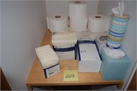 Toilet paper, kleenex, first aid items