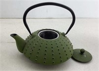 Cast iron tea kettle or flower pot