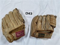 Pair of vintage baseball mitts.