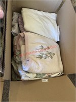 Bath towels and linens box lot   (living room)