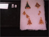 Group of Christmas trees: pin and earrings,