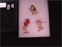 Three rhinestone and enameled birds by Dorlan