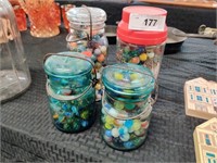 4 Jars of old marbles