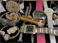 Watches and Assorted costume jewelry and more.
