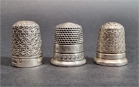THREE STERLING SILVER THIMBLES