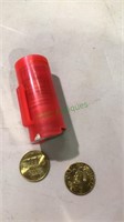 4 inch tube of sports stars collector coins,