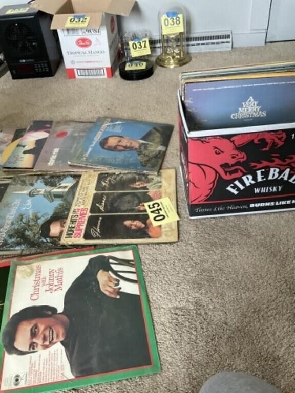 Action of albums, including
Johnny Mathis, Cat