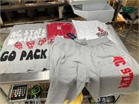 3 NC State shirts and a pair of shorts