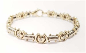 14K gold fancy link bracelet set with 10 diamonds-