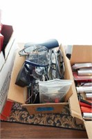box of assorted reading glasses and sunglasses