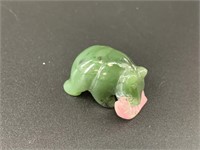 Alaskan Kobuk jade carved bear who has caught a la