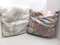 Two throw pillows leaves