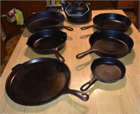 7 pcs cast iron cookware; as is