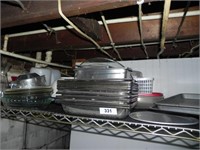 Top Shelf of Cookware, Warming Pans, Pie Plates,