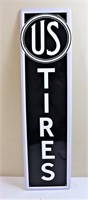 Tall metal US Tires sign