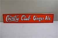 Orange metal Country Club Ginger Ale sign