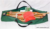 A Croquet Set in Green Carry Bag.