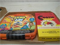 old cootie game and sand art