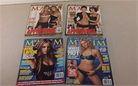 Four Maxim Magazines