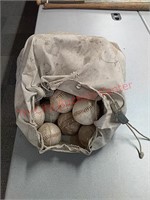 Softballs in vintage mail bag