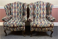 (2) Multicolored Wingback chairs, 1 and 2x the