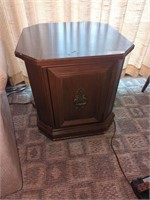 Wooden end table with door