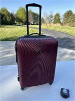 Revo expanding carry on suitcase 21”x 14”
Wheels