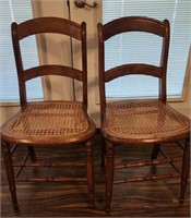 Two square bottom cane chairs