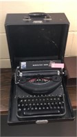Remington Rand typewriter with case in beautiful