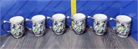 temp-tations Mugs