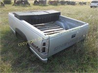 Silver Chevrolet long wide take-off pickup bed,