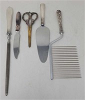 Group of sterling-handled utensils