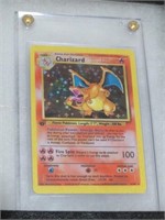 CHARIZARD FIRST EDITION POKEMON CARD IN CASE