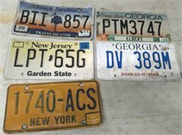 TRAY OF LICENSE PLATES