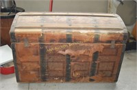 Antique trunk. Lid detached. Dimensions: 18" high