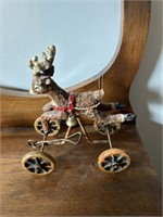 Vintage Reindeer on Sled Wheels