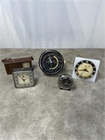 Small table clocks, vintage channel master, and