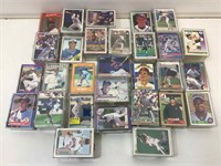Mixed lot of sports cards in cases