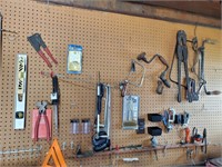 Level hand drill and more contents of peg board