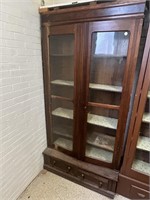 Early bookcase with two glass doors and two